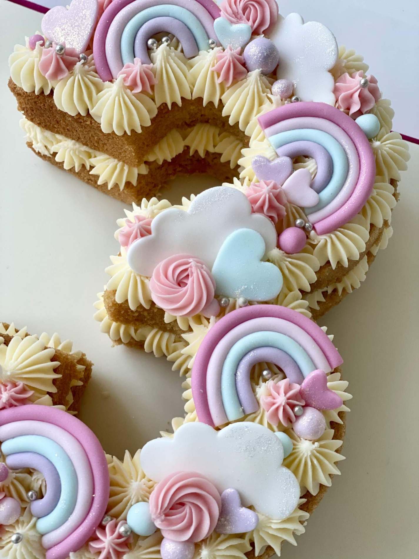 Clouds and Rainbows number cake | Birthdays